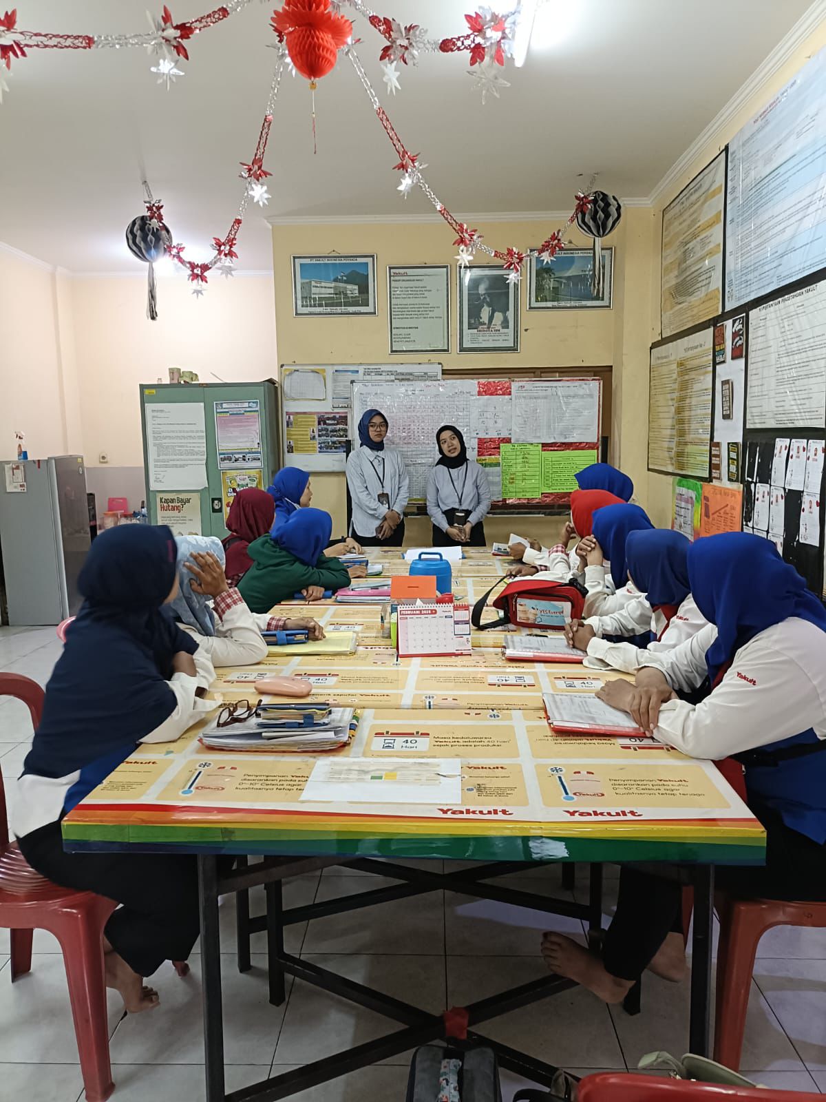 Pembayaran Lebih Mudah, BRI Ajarkan QRIS dan BRImo ke Yakult Lady